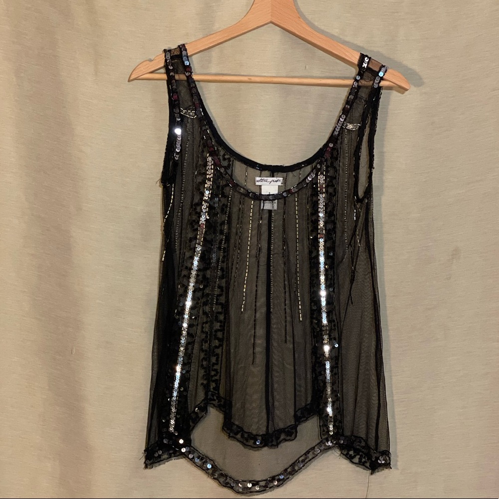 Sheer tank style party top with light catching beads and sequins